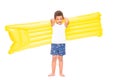 beautiful african american boy holding swimming mattress and looking at camera Royalty Free Stock Photo