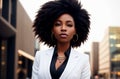 Beautiful african american in business suit on background of metropolitan. Elegant black woman in classic style in