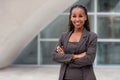 Cheerful smiling businesswoman portrait, happy african american corporate executive at work Royalty Free Stock Photo