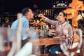 Beautiful African-American couple in love having a great time together at their dating, an attractive couple enjoying Royalty Free Stock Photo