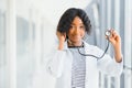 Beautiful african american female pediatric nurse in modern office Royalty Free Stock Photo