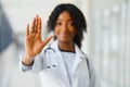 Beautiful african american female pediatric nurse in modern office