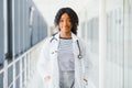 Beautiful african american female pediatric nurse in modern office Royalty Free Stock Photo