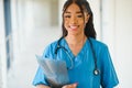 Beautiful african american female pediatric nurse in modern office Royalty Free Stock Photo