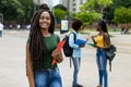 Beautiful african american female student with amazing hairstyle Royalty Free Stock Photo