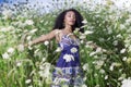 Beautiful African American girl enjoys summer day. Royalty Free Stock Photo