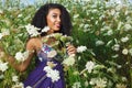 Beautiful African American girl enjoys summer day. Royalty Free Stock Photo