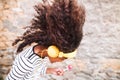 Beautiful african american girl with headphones, listening music Royalty Free Stock Photo