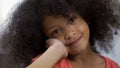 Beautiful African-American girl posing for camera and smiling close-up happiness Royalty Free Stock Photo