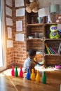 Beautiful african american toddler taking skittles to play bowling at kindergarten