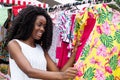 Beautiful african american woman shopping clothes at market Royalty Free Stock Photo