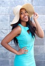 Beautiful african american woman smiling with sun hat Royalty Free Stock Photo