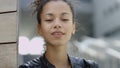 Beautiful african american woman in urban background.