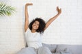 Beautiful black woman waking up in her bed Royalty Free Stock Photo