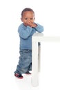 Beautiful african baby standig with a table Royalty Free Stock Photo
