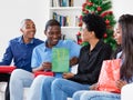 Beautiful african african family celebrating christmas with gifts and presents Royalty Free Stock Photo