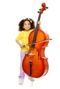 Beautiful African girl holds cello and fiddlestick Royalty Free Stock Photo