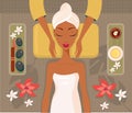 Beautiful African woman relaxing spa salon Face Body massage concept Royalty Free Stock Photo