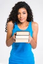 Beautiful afro american woman holding books Royalty Free Stock Photo