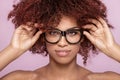 Afro girl in eyeglasses, smiling. Royalty Free Stock Photo