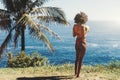 Beautiful Afro girl near the ocean Royalty Free Stock Photo