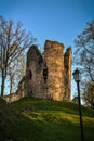 Beautiful afternoon light in park with old castle ruins Royalty Free Stock Photo