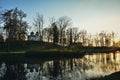 Beautiful afternoon light in public park with church Royalty Free Stock Photo