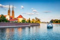 Beautiful afternoon scene of famous Tumski island with cathedral of St. John on Odra river. Nice summer cityscape of Wroclaw, Pola