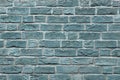 Beautiful aged and weathered blue brick wall surfaces in a close up view Royalty Free Stock Photo