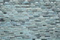 Beautiful aged and weathered blue brick wall surfaces in a close up view Royalty Free Stock Photo