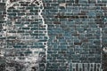 Beautiful aged and weathered blue brick wall surfaces in a close up view Royalty Free Stock Photo