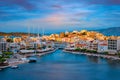 Beautiful Agios Nikolaos town on lake Voulismeni on sunset. island Crete, Greece Royalty Free Stock Photo