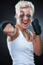 Beautiful agressive boxer girl Royalty Free Stock Photo
