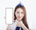Beautiful Airline stewardess showing the mobile phone with blank screen on white background