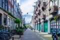 Beautiful alley alongside dutch houses in Amsterdam Netherlands