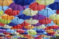 Beautiful alley of multi-colored umbrellas.