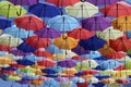 Beautiful alley of multi-colored umbrellas.