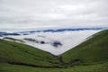 Beautiful alpine meadows, clouds and mists in the mountains, like fairyland Royalty Free Stock Photo