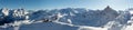 Beautiful alpine panoramic view snow capped mountains. Winter mountain scenery Royalty Free Stock Photo