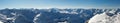 Beautiful alpine panoramic view snow capped mountains. Winter mountain scenery Royalty Free Stock Photo