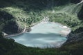 Beautiful alpine view of a green lake with a dam at the famous Grossglockner High Alpine Road, Salzburg, Austria Royalty Free Stock Photo