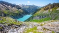 Beautiful alpine walley with azure blue water dam Royalty Free Stock Photo