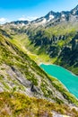 Beautiful alpine walley with azure blue water dam Royalty Free Stock Photo