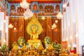 Beautiful altar of a Buddhist temple with sculptures of the god
