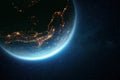 Beautiful amazing planet earth with a blue glow and city lights at night in outer space. Humanity and Life Concept Royalty Free Stock Photo