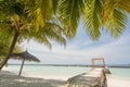 Beautiful amazing tropical summer beach landscape view with ocean,blue sky, cabana at the island at resort Royalty Free Stock Photo