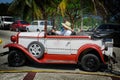 Beautiful amazing view of classic retro vintage car in tropical garden