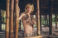 Beautiful amazon woman posing in the jungle