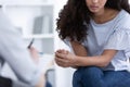 Beautiful african american girl during meeting with professional counselor