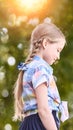 Beautiful american portrait of schoolgirl. Preschool kid. Profile look